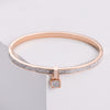 Rose Gold Lock Charm Bangle Bracelet.