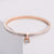 Rose Gold Lock Charm Bangle Bracelet.